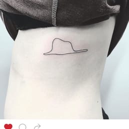 One my new tattoos by Fer - l'éléphant dans un boa/chapeau from Le Petit Prince.
