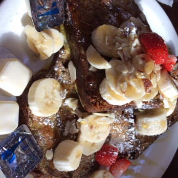Nikos Restaurant - Banana bread French toast with bananas, strawberries and almonds on top. Delicious. - Diners Near Me - Weymouth, Massachusetts Nikos Restaurant - Banana bread French toast with bananas, strawberries and almonds on top. Delicious. - Diners Near Me - Weymouth, Massachusetts