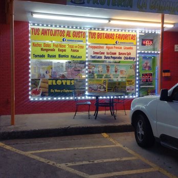Fruteria La Banana - a car parked in front of a store - Ice Cream & Frozen Yogurt Near Me - Irving, Texas