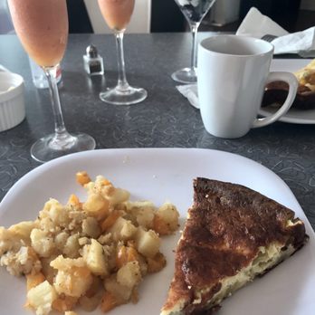 Palm Springs Rendezvous - Quiche and potatoes for breakfast. - Hotels Near Me - Palm Springs, California Palm Springs Rendezvous - Quiche and potatoes for breakfast. - Hotels Near Me - Palm Springs, California