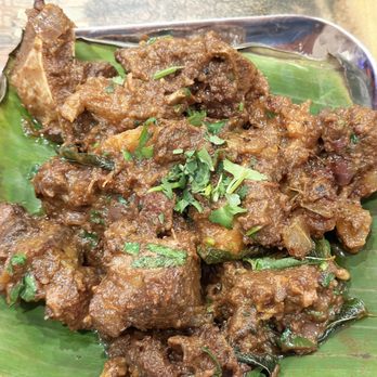 Thiru Kuppusamy Unavagam - The spicy MUTTON SUKKA VARUVAL (served boneless as well) is delectable and goes well with rice or parathas, or just stand-alone! - Indian Near Me - Irving, Texas Thiru Kuppusamy Unavagam - The spicy MUTTON SUKKA VARUVAL (served boneless as well) is delectable and goes well with rice or parathas, or just stand-alone! - Indian Near Me - Irving, Texas