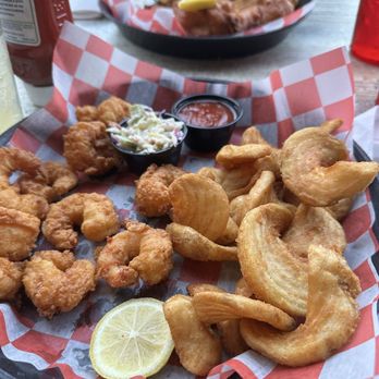 Tortuga's Kitchen & Bar - Fried shrimp, sidewinder fries, coleslaw and cocktail sauce.  Delicious - Bars Near Me - Flagler Beach, Florida