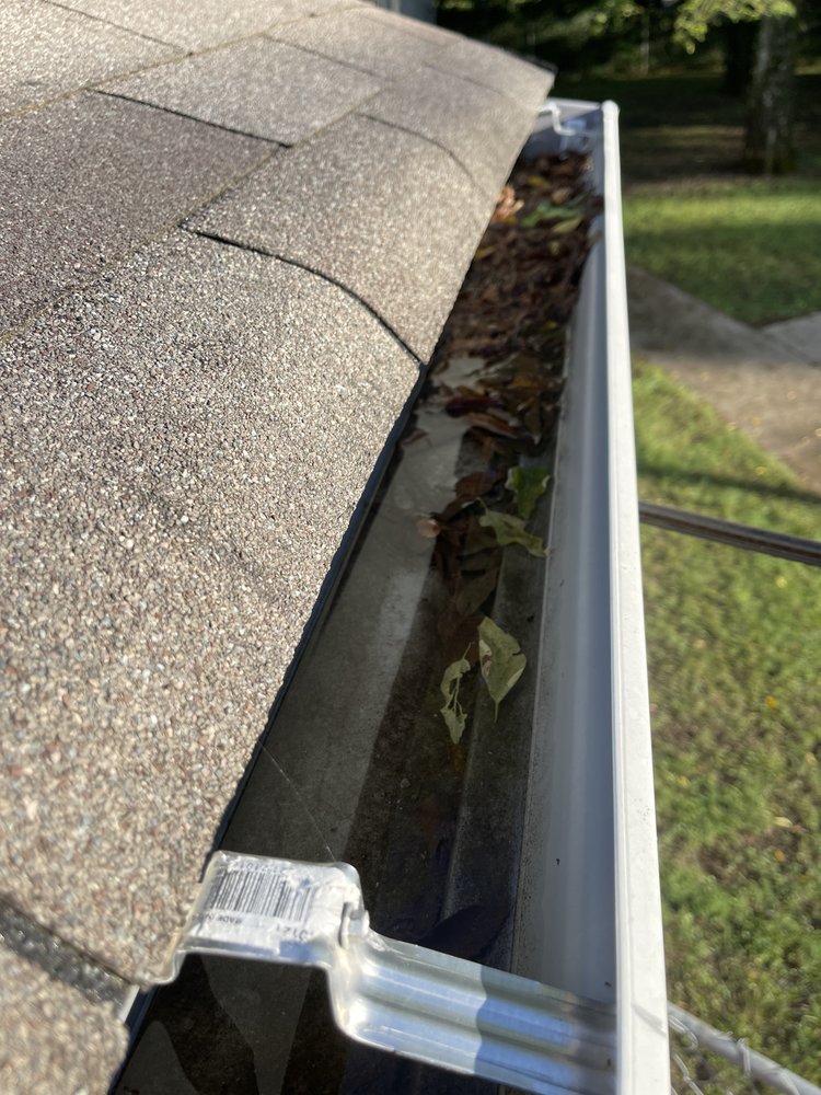 Slide of Marcus Gutters Cleaning