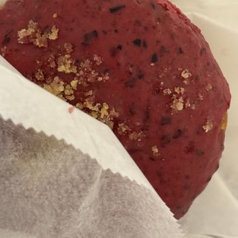 Union Square Donuts - Sweet Corn & Blueberry $4.85 fluffy brioche donut with a sweet corn pastry cream, topped with blueberry glaze and a cornbread crumble. - Donuts Near Me - Boston, Massachusetts