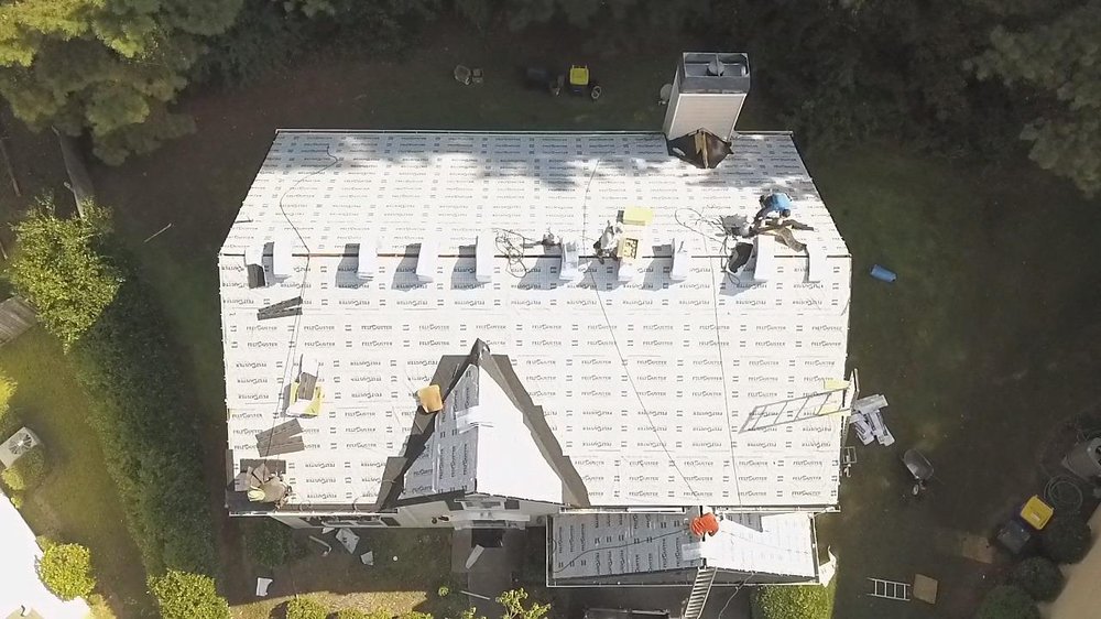 Slide of AMC Roofing & Construction