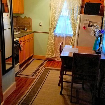 Catskill Bungalow - Dining area and kitchen (fridge with freezer, microwave, coffee maker, electric water kettle, sink,stove, etc) - Vacation Rentals Near Me - Prattsville, New York Catskill Bungalow - Dining area and kitchen (fridge with freezer, microwave, coffee maker, electric water kettle, sink,stove, etc) - Vacation Rentals Near Me - Prattsville, New York
