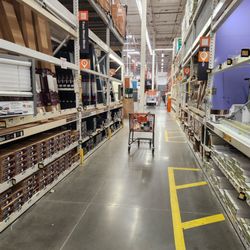 The Home Depot - The aisle where window blinds and shutters are, a staff member can cut cut them for you right then and there