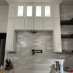 Midlo Contracting - Kitchen backsplash and cabinetry