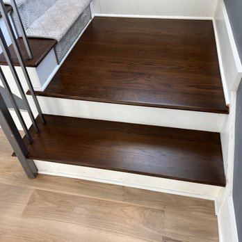 Eastwood Group - a staircase with white railings - Flooring Near Me - Westport, Connecticut Eastwood Group - a staircase with white railings - Flooring Near Me - Westport, Connecticut