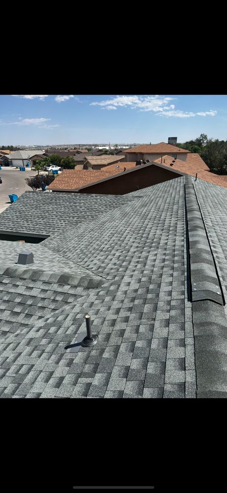 Slide of Mann & Sons Roofing