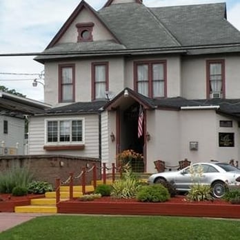 The Century Manor - a car parked in front of the house - New American Near Me - Olean, New York The Century Manor - a car parked in front of the house - New American Near Me - Olean, New York