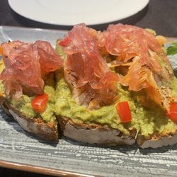 La Petite - The flambé salmon crostini.  Delicious.