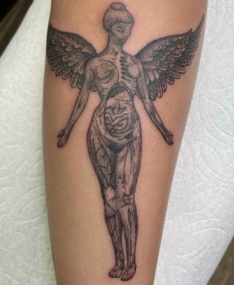 Rockin Ink Tattoo by null