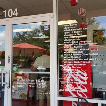 The Soup Shop - Front window and door. Also, many of the soups are listed on the glass. - Soup Near Me - Melbourne, Florida