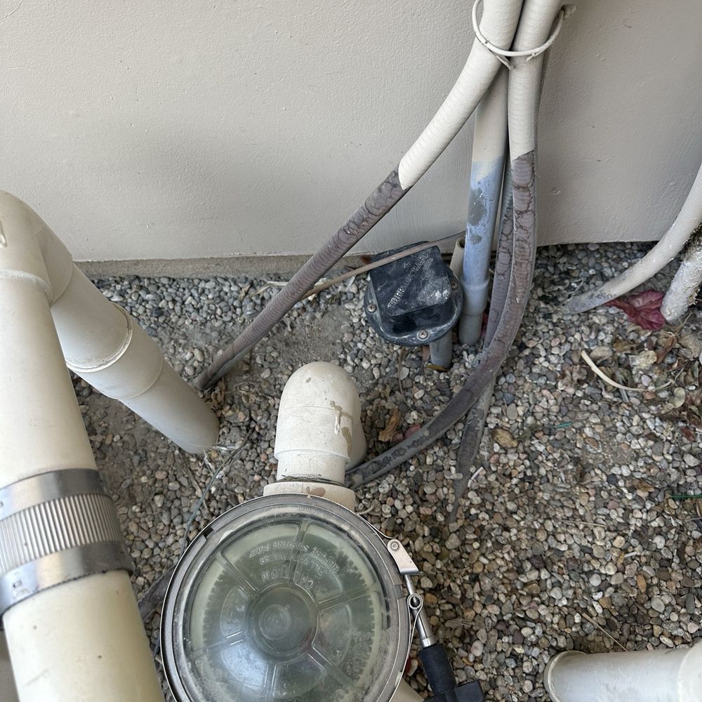 Maui Pool Service - Spa jet pump next to spa light wire. - Swimming Pools Near Me Maui Pool Service - Spa jet pump next to spa light wire. - Swimming Pools Near Me