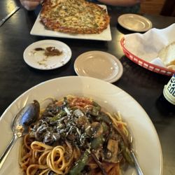 Di Rito's Italian Restaurant - 8" cheese pizza with Jalapeños and green chiles and pasta giardino with spaghetti sauce with green salad.