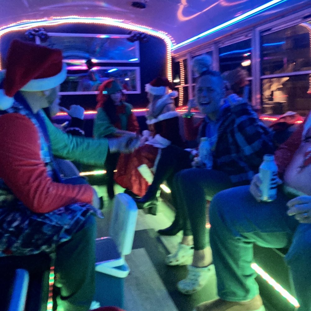 OBX Party Bus - a group of people on a bus - Party Bus Rentals Near Me OBX Party Bus - a group of people on a bus - Party Bus Rentals Near Me