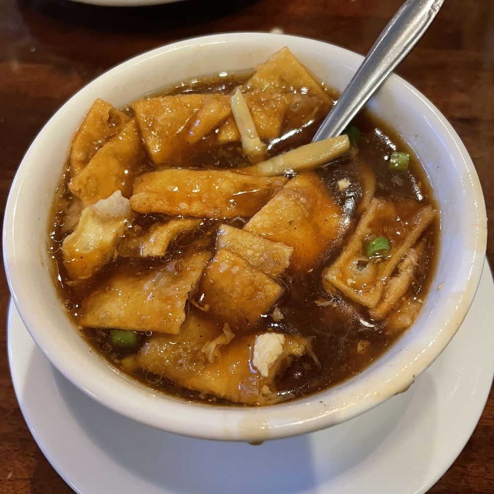 China Cafe - Hot and sour soup with fried wonton strips - Chinese Near Me - Austin, Texas China Cafe - Hot and sour soup with fried wonton strips - Chinese Near Me - Austin, Texas