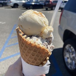 Photo of Yum Yums Ice Cream - Sea Isle City, NJ, United States. Peanut butter ripple and cookie jar in a waffle cone.