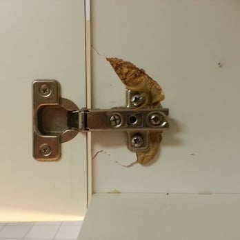 Presto Home Inspection - Kitchen cabinet damage with attempted self repair - Home Inspectors Near Me - Stuart, Florida Presto Home Inspection - Kitchen cabinet damage with attempted self repair - Home Inspectors Near Me - Stuart, Florida