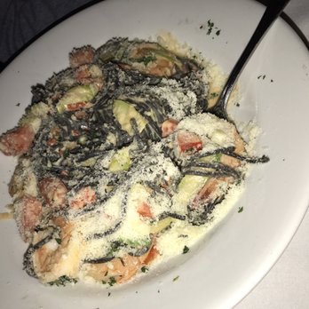 Basilico Ristorante - Black pasta with shrimp, mushroom and peppercorn, covered in Parmesan cheese - Italian Near Me - Doral, Florida Basilico Ristorante - Black pasta with shrimp, mushroom and peppercorn, covered in Parmesan cheese - Italian Near Me - Doral, Florida