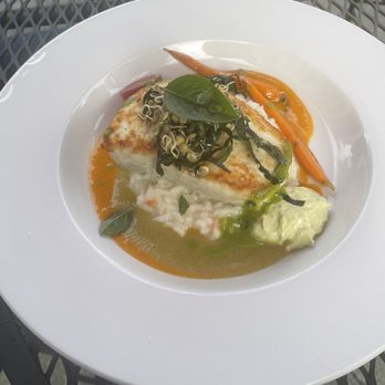 Inn At Ship Bay Restaurant - Halibut on a Basil risotto and fresh garden vegetables - American Near Me - Eastsound, Washington Inn At Ship Bay Restaurant - Halibut on a Basil risotto and fresh garden vegetables - American Near Me - Eastsound, Washington