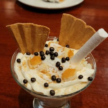 Fletcher's - Classic banana pudding according to the menu (baked Alaska in the background) - New American Near Me - Anchorage, Alaska