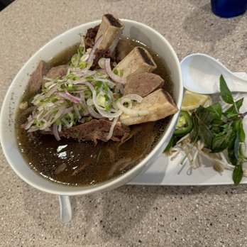 Pho Kitchen - House Special Pho with beef ribs and scallion and red onion garnish. - Vietnamese Near Me - Pinetop-Lakeside, Arizona