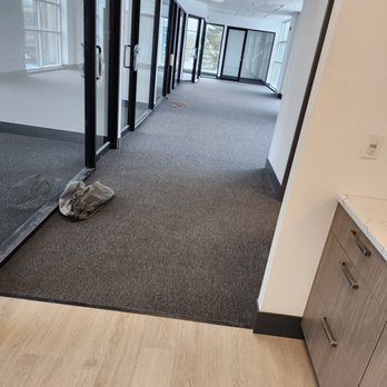 Edgestone Flooring - an empty office hallway - Flooring Near Me Edgestone Flooring - an empty office hallway - Flooring Near Me