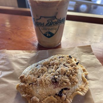 Evans Brothers Coffee - Huckleberry handpie and cardamon and cinnamon iced latte. - Coffee & Tea Near Me - Coeur d'Alene, Idaho Evans Brothers Coffee - Huckleberry handpie and cardamon and cinnamon iced latte. - Coffee & Tea Near Me - Coeur d'Alene, Idaho