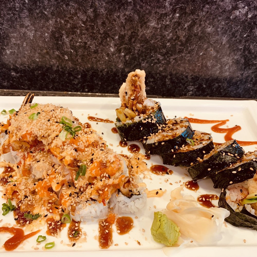 a plate of sushi on a table a plate of sushi on a table