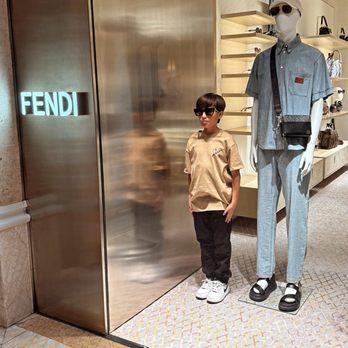 Wynn Plaza Shops - My son having fun while I pick out some FENDI - Shopping Centers Near Me - Las Vegas, Nevada