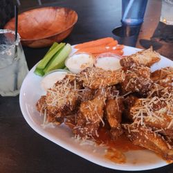 The Hot Buffalo - Spicy garlic parm chicken wings and a fresh margarita.