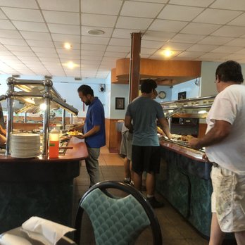 China Gourmet Buffet - a group of people preparing food - Chinese Near Me - Northmoor, Missouri