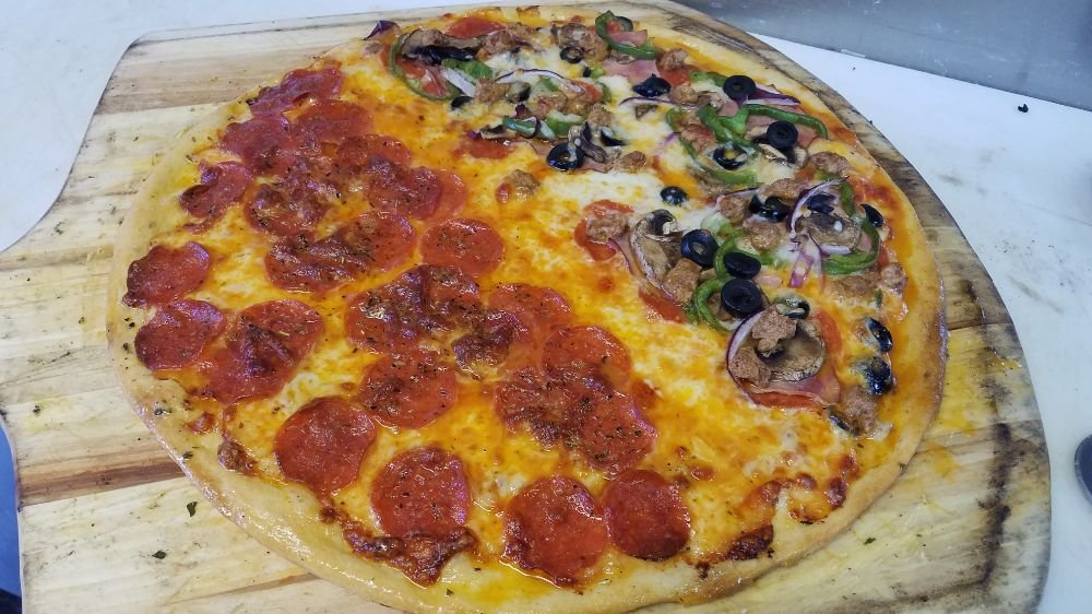Half pepperoni and half Supreme Yelp