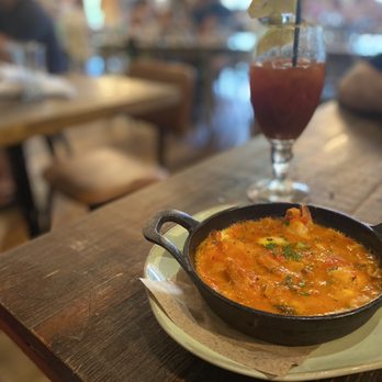 Kid Cashew - Shrimp and grits with Bloody Mary - Mediterranean Near Me - Charlotte, North Carolina