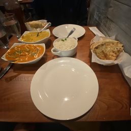Chicken Tikka Masala, Shrimp Mango Curry, Garlic Naan Bread, Nuts and Raisin Naan