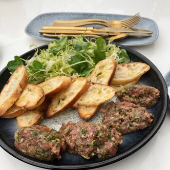 H Tasting Lounge - Steak tartare after it's prepared table side - Lounges Near Me - Vancouver, British Columbia