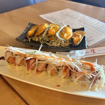 Sushi Kuu - Top: Baked Green Muscles Bottom: Fourth of July Roll - Sushi Bars Near Me - Visalia, California Sushi Kuu - Top: Baked Green Muscles Bottom: Fourth of July Roll - Sushi Bars Near Me - Visalia, California