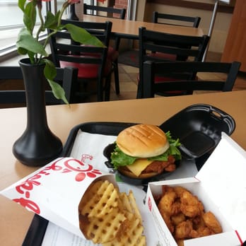Chick-fil-A - Deluxe sandwich, fries, nuggets and real flowers on the table! - Fast Food Near Me - Schaumburg, Illinois Chick-fil-A - Deluxe sandwich, fries, nuggets and real flowers on the table! - Fast Food Near Me - Schaumburg, Illinois