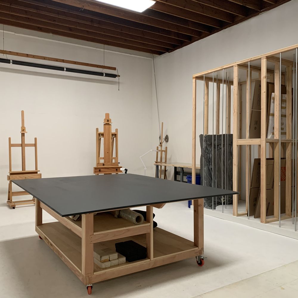 Jack Mazur - Work table and vertical storage rack for paintings built by Jack - Carpenters Near Me