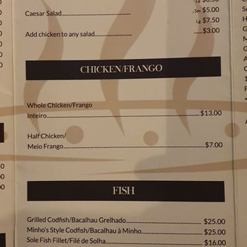 Minho - a hand holding a menu for a restaurant - Portuguese Near Me - Bradford, Ontario Minho - a hand holding a menu for a restaurant - Portuguese Near Me - Bradford, Ontario