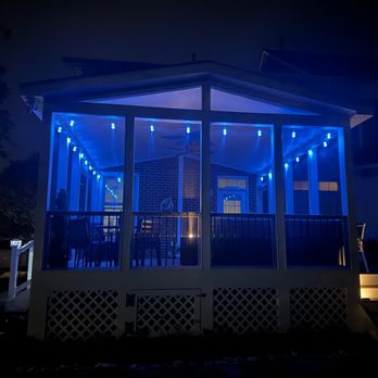 OutBack Construction - a screened porch with blue lights - General Contractors Near Me OutBack Construction - a screened porch with blue lights - General Contractors Near Me