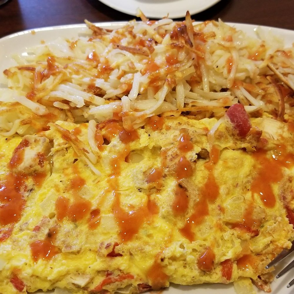 Brunch Cafe - Fajita omlette with hot sauce on top - American Near Me - Livonia, Michigan Brunch Cafe - Fajita omlette with hot sauce on top - American Near Me - Livonia, Michigan