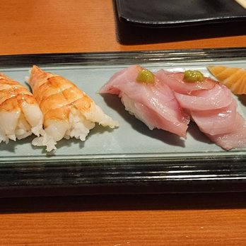 DAI Sushi - 4 of sushi. From the left, fresh live halibut, Tiger shrimp, yellow tail, salmon. - Japanese Near Me - Westminster, California DAI Sushi - 4 of sushi. From the left, fresh live halibut, Tiger shrimp, yellow tail, salmon. - Japanese Near Me - Westminster, California