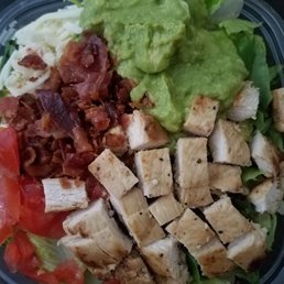 Southwest salad before the dressing. Chicken, avocado, tomatoes, cheese, and bacon. Southwest salad before the dressing. Chicken, avocado, tomatoes, cheese, and bacon.