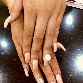 American Nails - I went back and got this set for my graduation and everyone was in LOVE with it. Love the 3D rose with the diamond! Done by Catherine - Nail Salons Near Me - Huntington Park, California