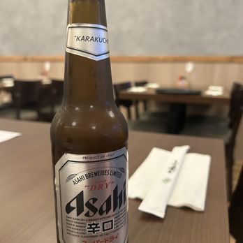 Wa Ramen - a bottle of beer on a table - Ramen Near Me - Orlando, Florida Wa Ramen - a bottle of beer on a table - Ramen Near Me - Orlando, Florida
