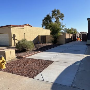 G&S Landscaping - This is the finished job. 60 foot long concrete slab and perfectly matched red rock. - Landscape Architects or Designers Near Me