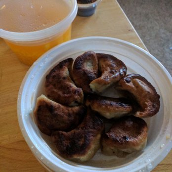 Wok & Roll - Inedible BURNT fried dumplings and weird tasting and odd orange colored chicken rice soup!!!! - Chinese Near Me - Leland, North Carolina Wok & Roll - Inedible BURNT fried dumplings and weird tasting and odd orange colored chicken rice soup!!!! - Chinese Near Me - Leland, North Carolina
